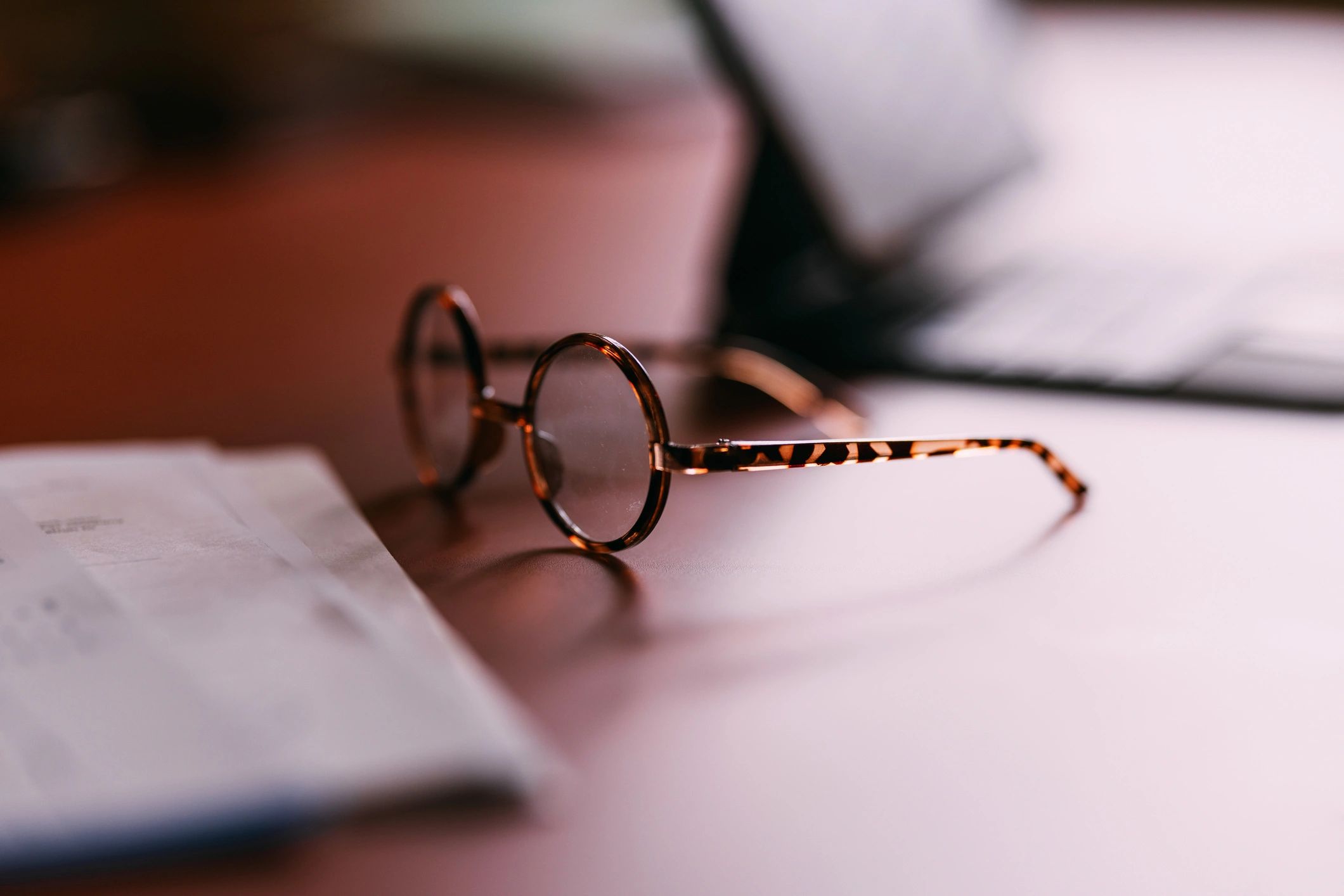 Eyeglasses on a desk