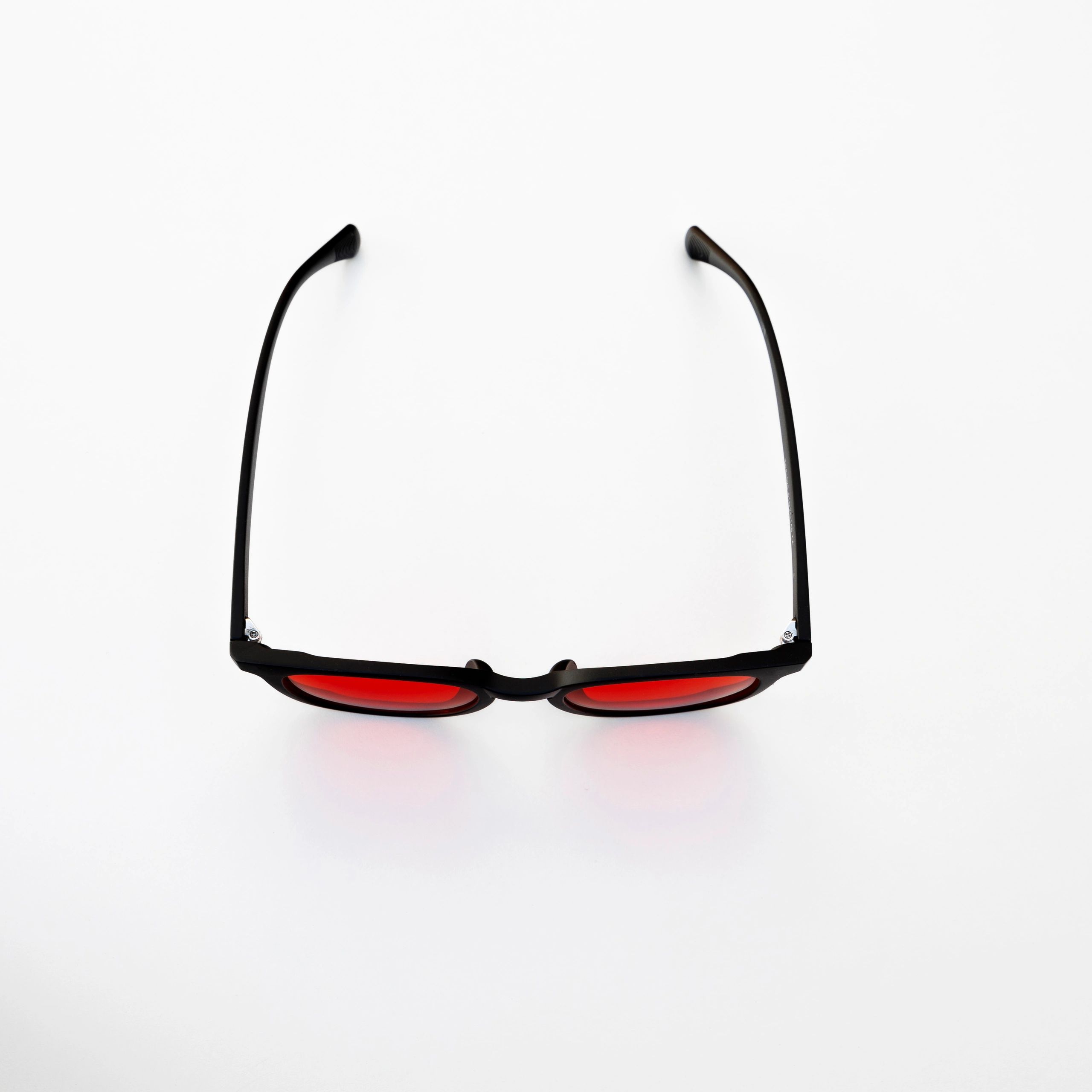 Red lens eyewear product photo