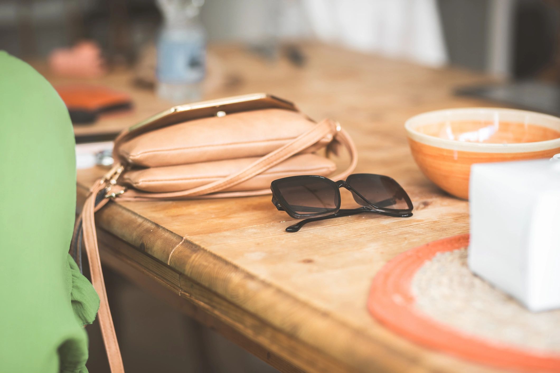 Sunglasses on a wooden table
