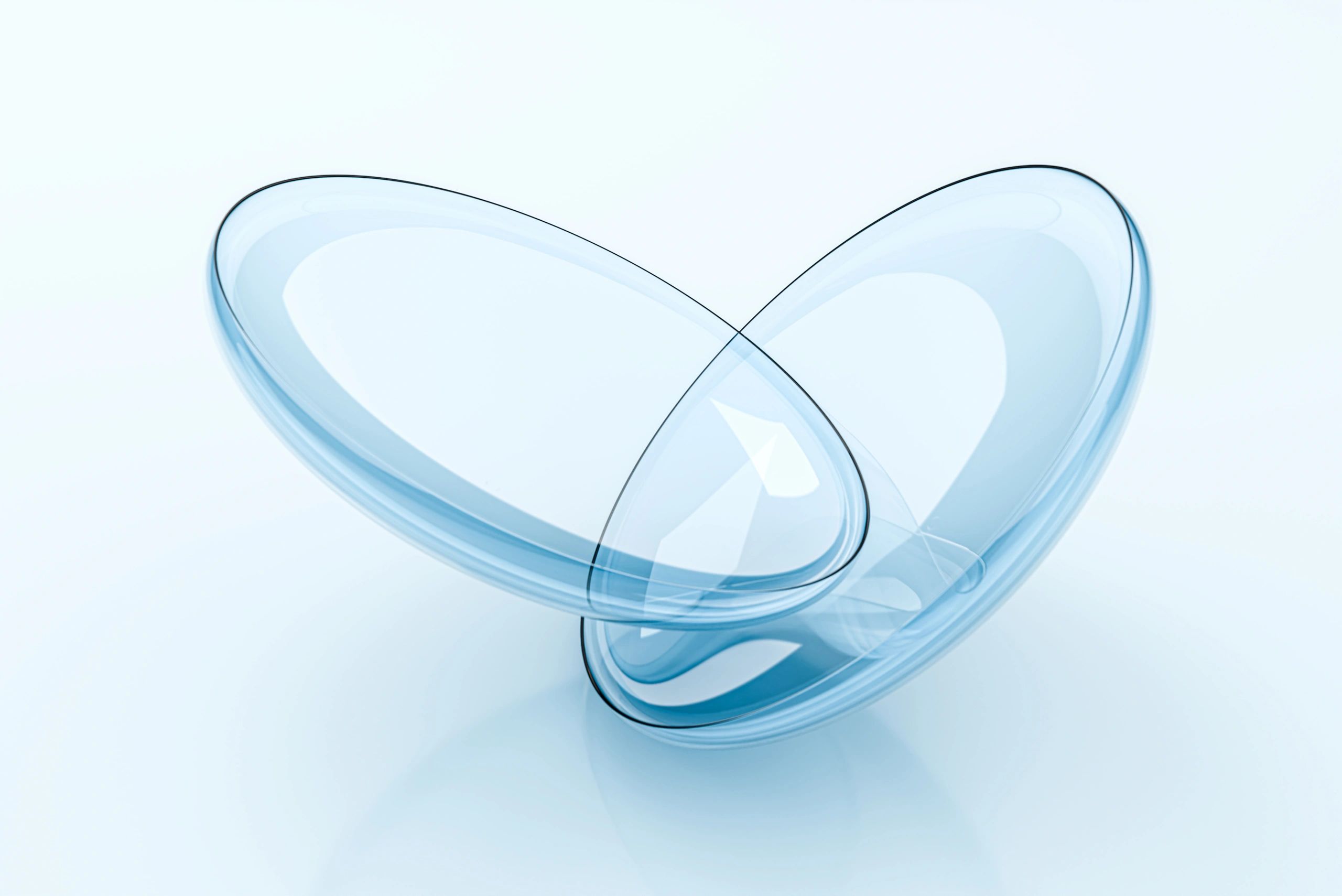 Contact lenses on light blue background